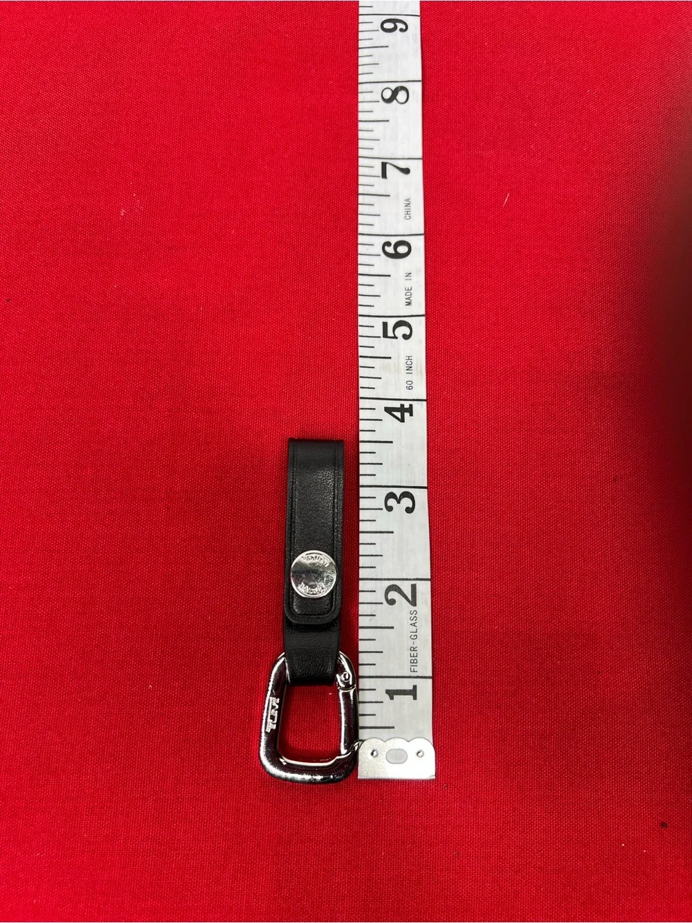 Tumi Black Leather Key Fob with Silver Hardware Key chain